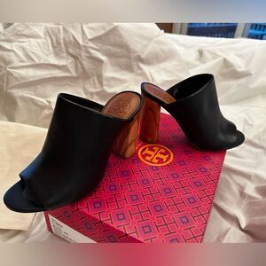 Tory Burch black leather mules. Excellent condition.